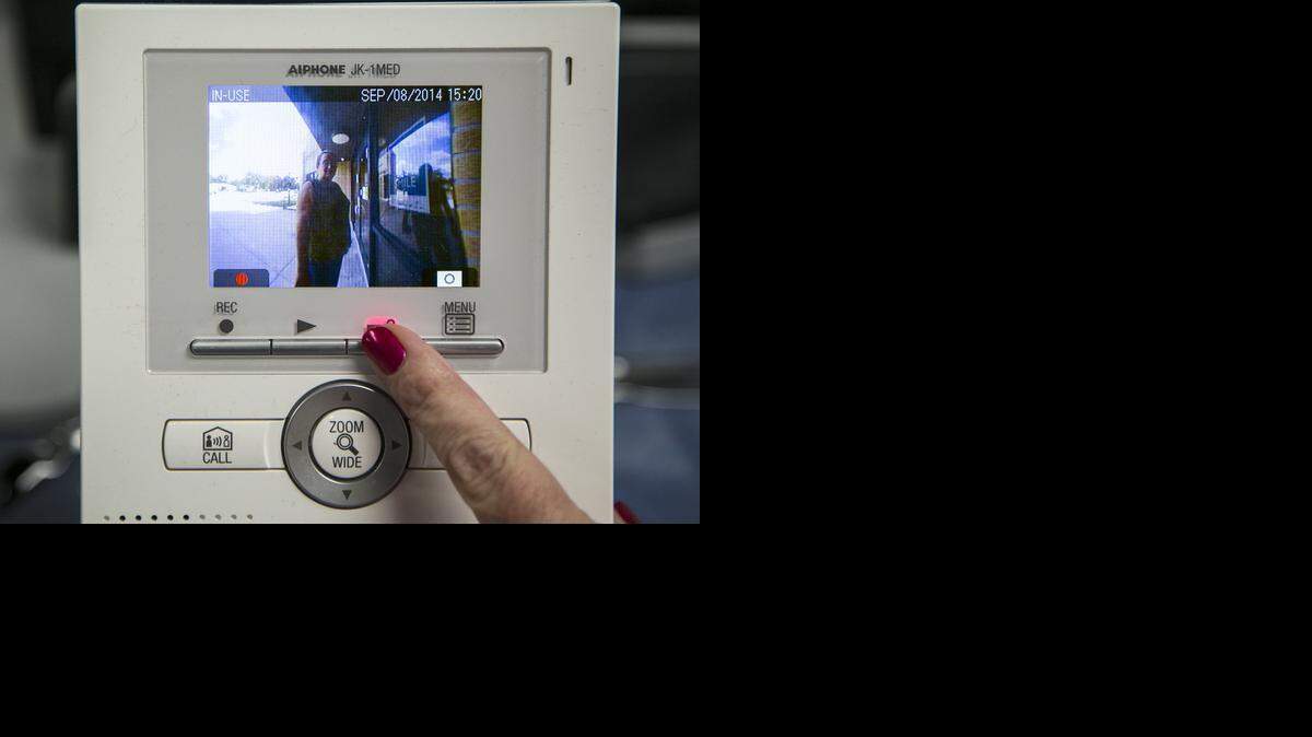 
Chisholm Trail Elementary in Park City has a buzzer/camera system to allow people to enter and be identified by a video monitor in the school office. (Sept. 8, 2014) 
