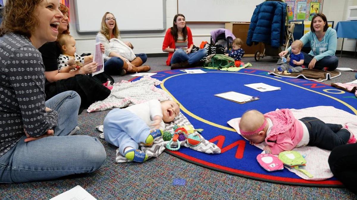Moms and babies attend class at Maize Early Childhood Center. The moms discussed topics form baby food to carriers. (Feb. 9, 2016)