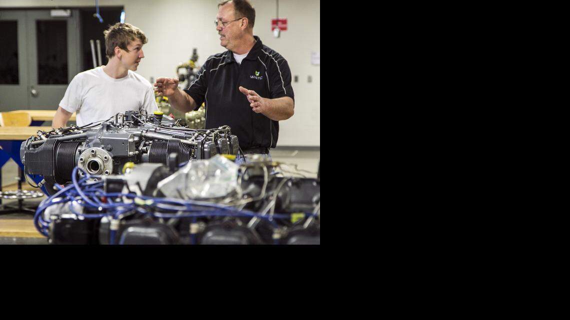 
Aircraft power plant student Blake Meier, left, and instructor Phil Taylor prepare for Meier's oral and practical exam at the National Center for Aviation Training, operated by the Wichita Area Technical College. (Feb. 13, 2015) 
