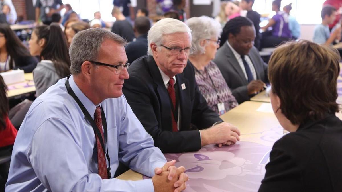Wichita school board members will meet in public Thursday to begin their process of searching for a new superintendent to replace outgoing John Allison, shown at left in this file photo.