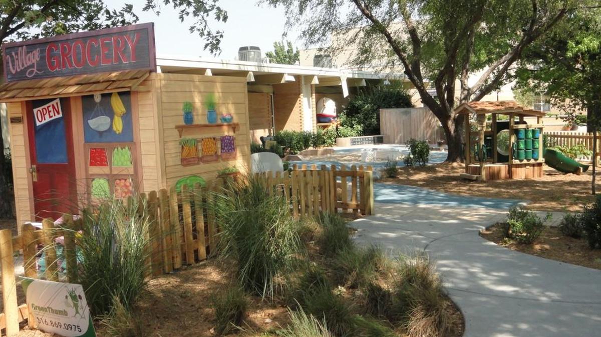 
A village grocery is part of the new outdoor play space at Wichita Collegiate School.
