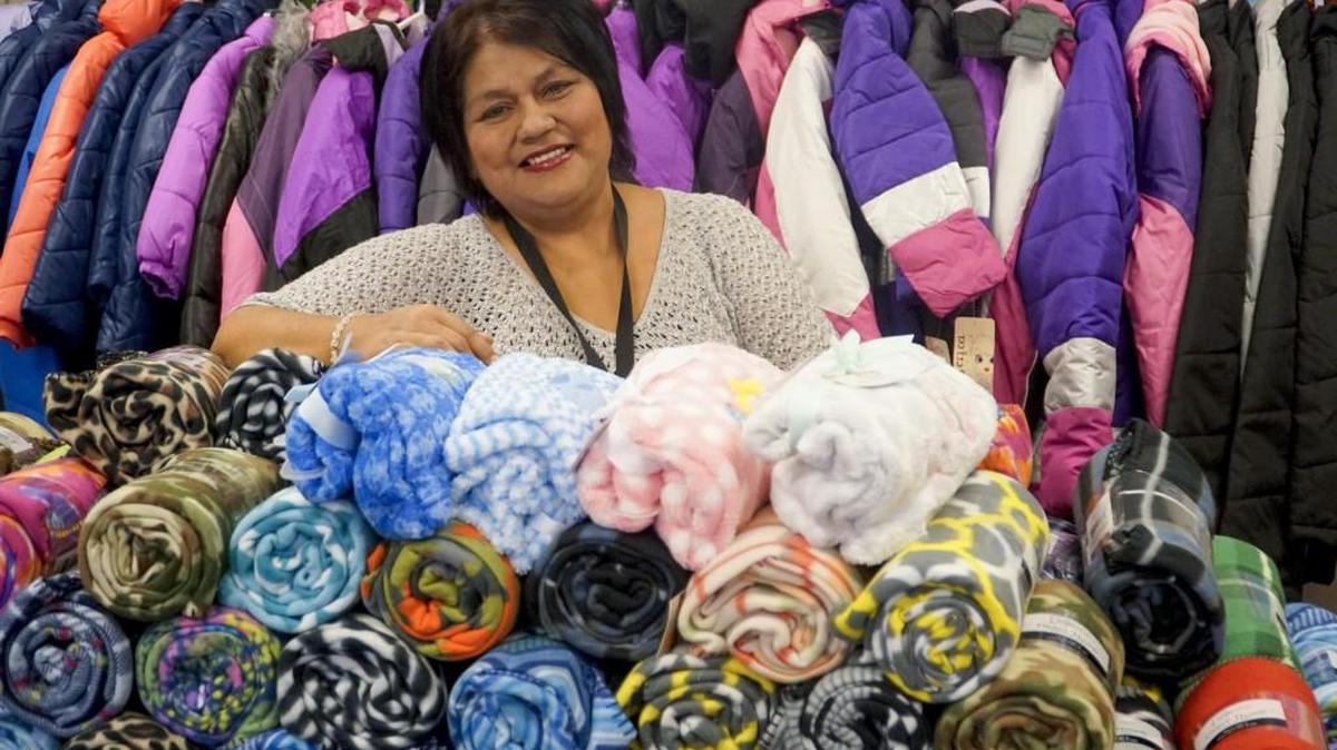 Cynthia Martinez, a liaison with the homeless education program for USD 259, has been collecting blankets and jackets for homeless kids and has acquired 200 blankets. (Dec. 6, 2016)