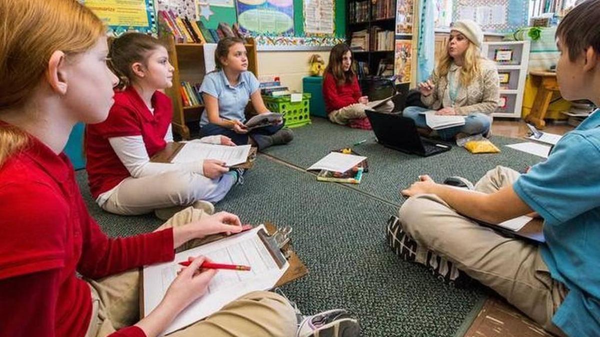 Gifted-education students listen to a lesson from Andrea Piros at McCollom Elementary School in 2015.