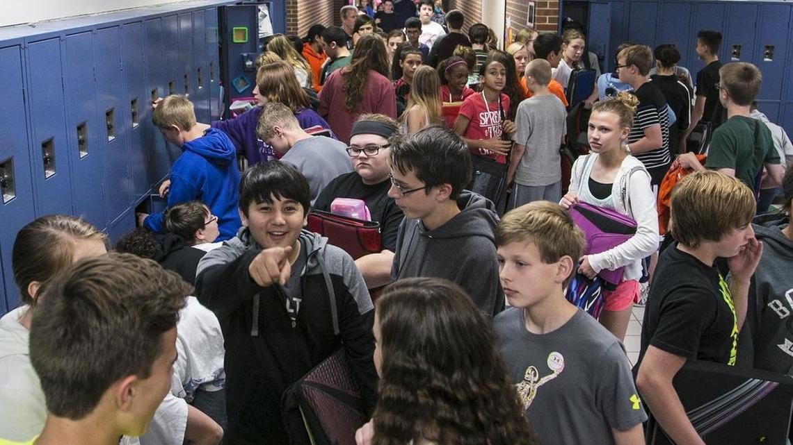 
Maize Middle School students in the sixth-grade hallways. The Maize district, along with Wichita and other suburban districts, expects enrollment to increase when the annual official head count is taken Monday. (May 13, 2015) 
