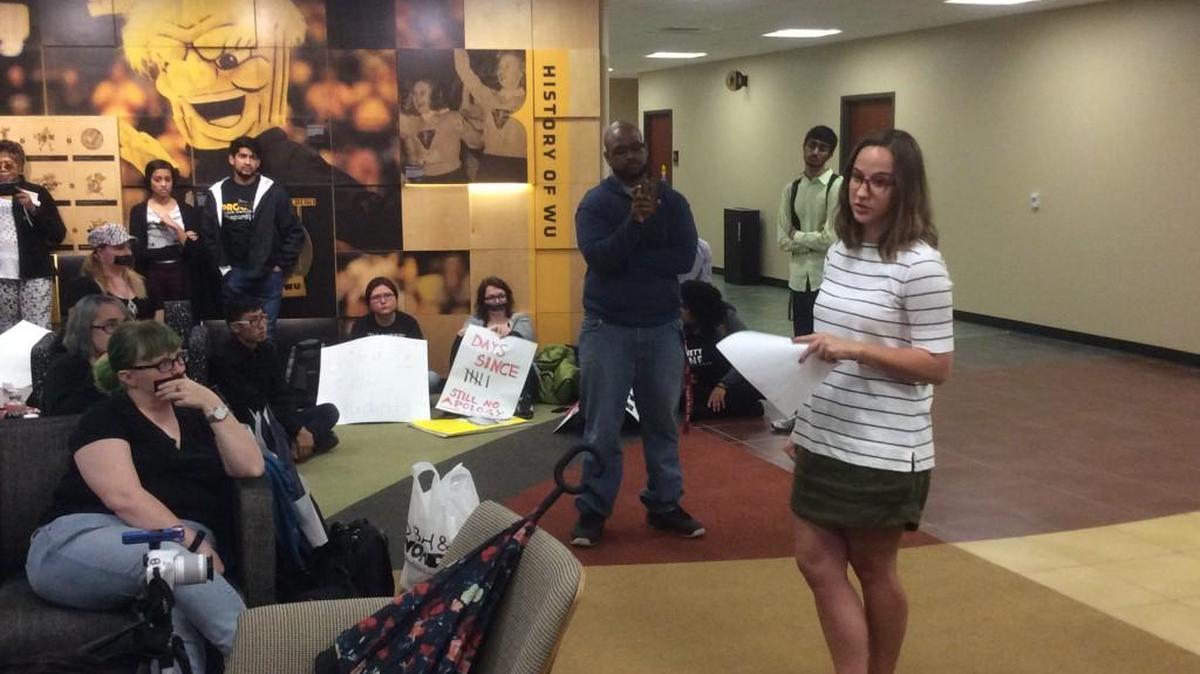 Wichita State University student president Paige Hungate, right, addresses other students during a protest Wednesday at the Rhatigan Student Center. (May 10, 2017)