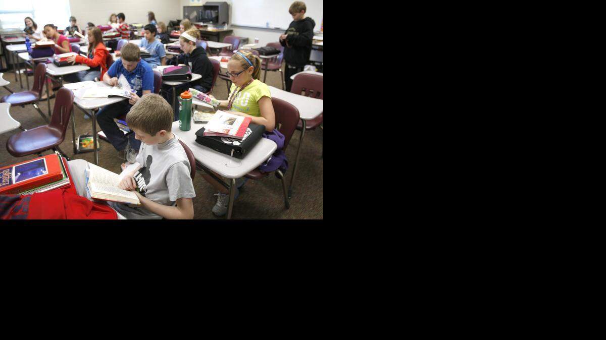 
Maize Middle School South sixth-grade students read during class. The Maize school board has voted to keep the current student-placement system. (Feb. 21, 2012)
