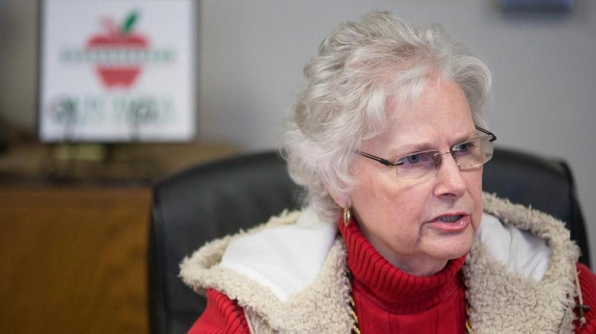 Sheril Logan, president of the USD 259 school board, has apologized for a comment she made about “Indians running loose” in schools.