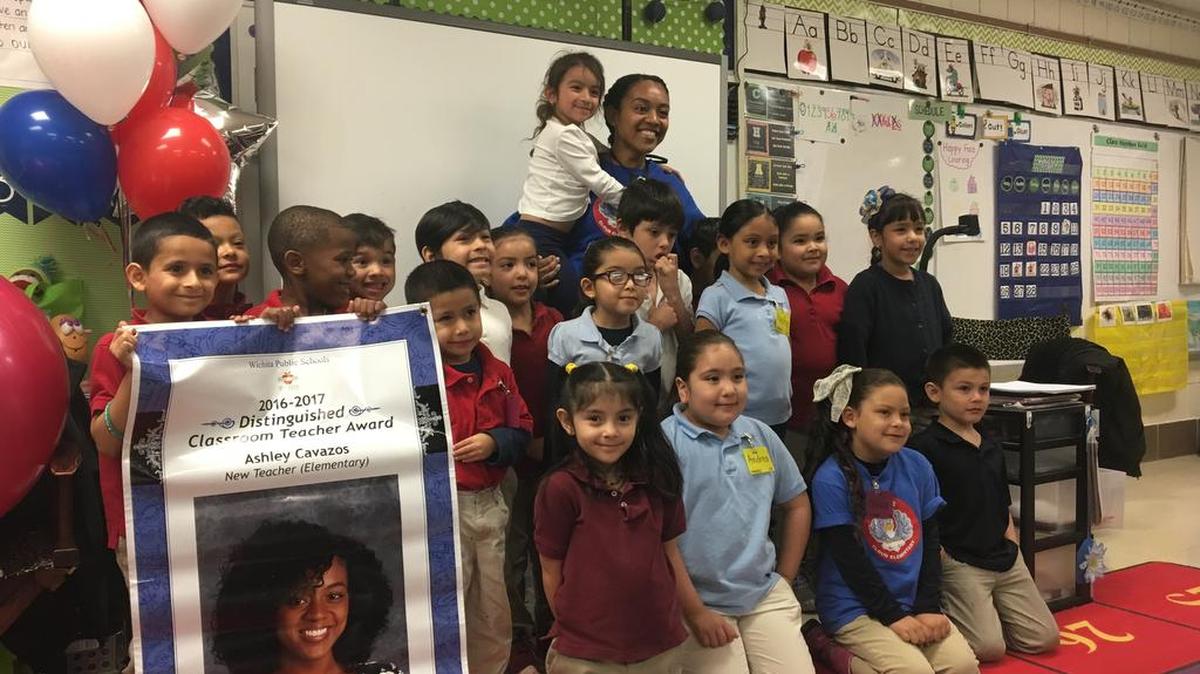Ashley Cavazos poses with her kindergarten students at Cloud Elementary School after receiving a 2017 Distinguished Classroom Teacher Award on Friday.