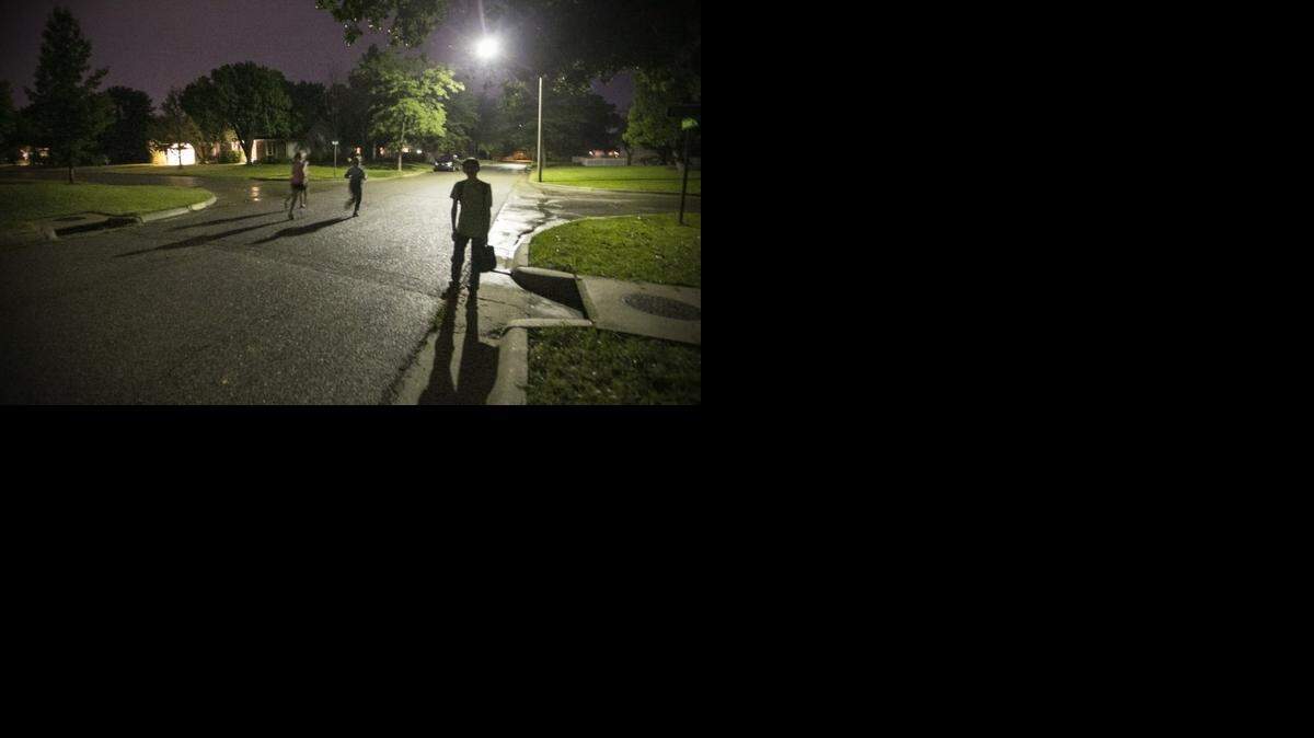 
Corbin Prichard, a freshman at Northeast Magnet High School, catches his bus at 6:10 every morning to get to Northeast Magnet, which starts at 7 a.m. (Aug. 29, 2014)
