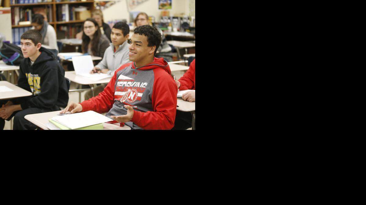 
North High student Anderson Tatum participates in a discussion in AP History II class taught by Ed Morales. (Feb. 24, 2015) 
