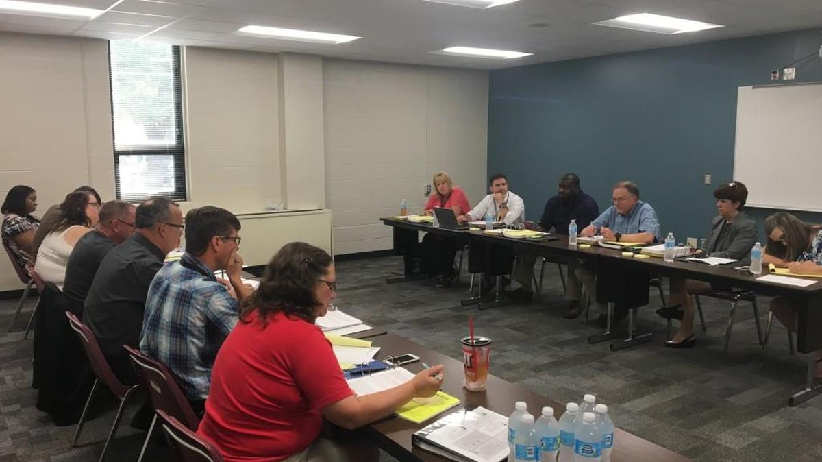 Teams for the Wichita teachers union, left, and the Wichita school district met last month to begin negotiating the teacher contract. (Aug. 9, 2017)