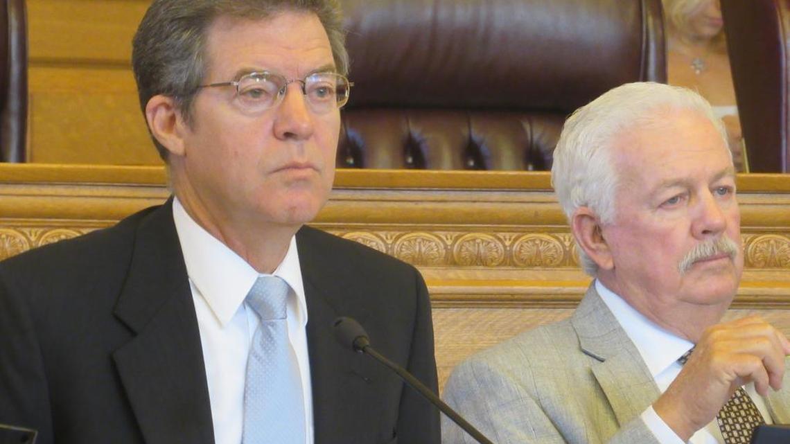 
Gov. Sam Brownback presides over the State Finance Council on Monday as school districts seek more funding. To his left is House Speaker Ray Merrick. (Aug. 24, 2015)
