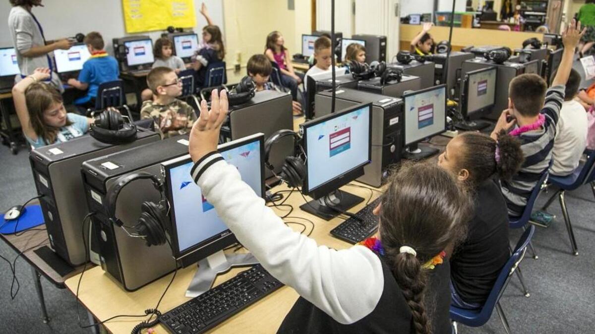 McLean Elementary students take practice state assessment tests in 2014 as part of a statewide effort to test server capacity. (Oct. 28, 2014)