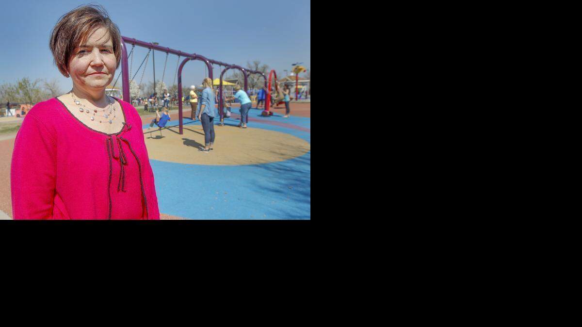 
Jolinda Kelley, mother of Michael Kelley, who has Down syndrome, held a press conference Saturday at Sunrise Boundless Playground in Sedgwick County Park in hopes of changing the East High policy regarding the awarding of athletic letters to special-needs students. (March 28, 2015)

