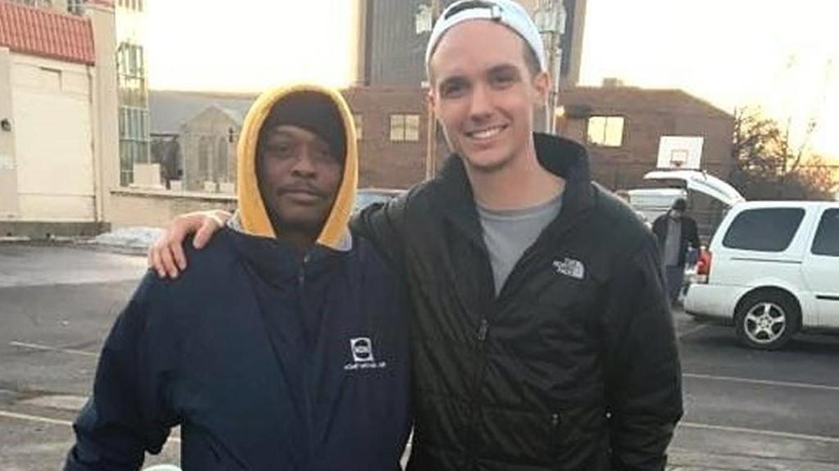 Dane Laughlin, right, poses with Rich, one of the people at the Lord’s Diner who benefited from the Wichita State University Greek communities’ impromptu clothing drive.