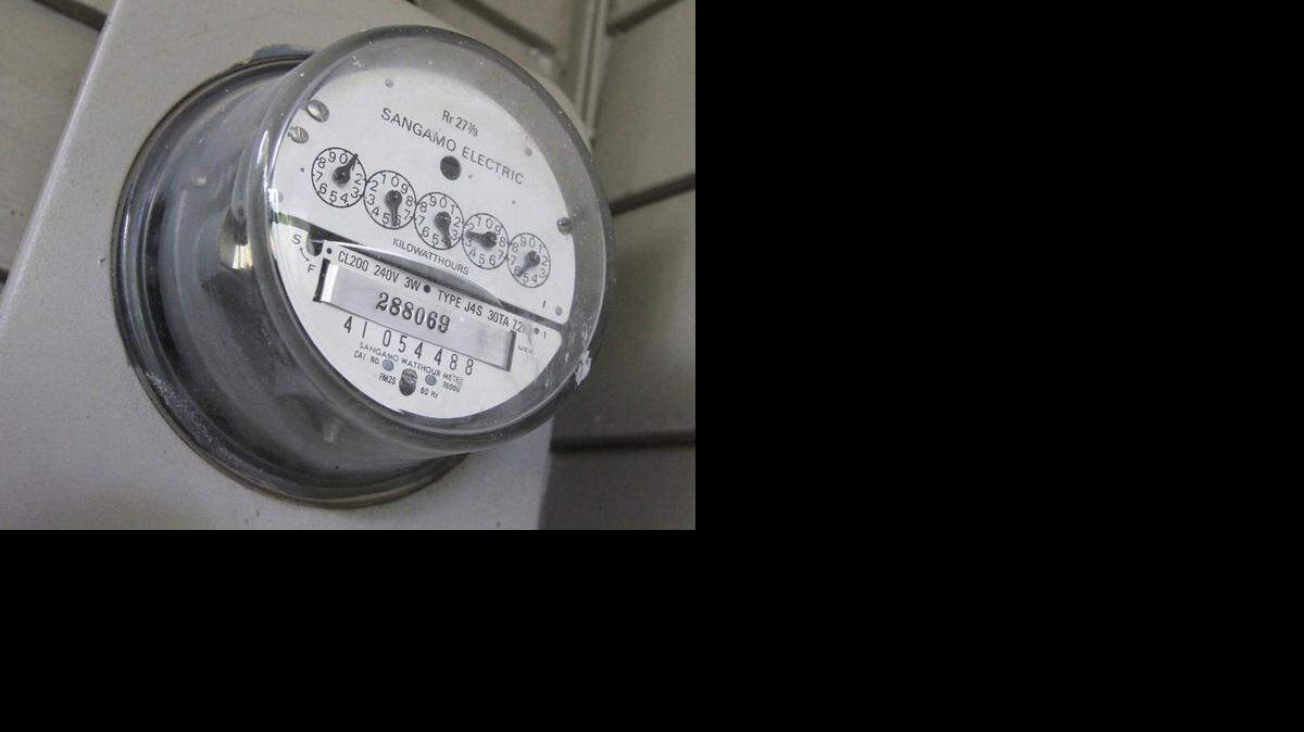 
Electric meter on the side of a Wichita house. (Oct. 8, 2014) 
