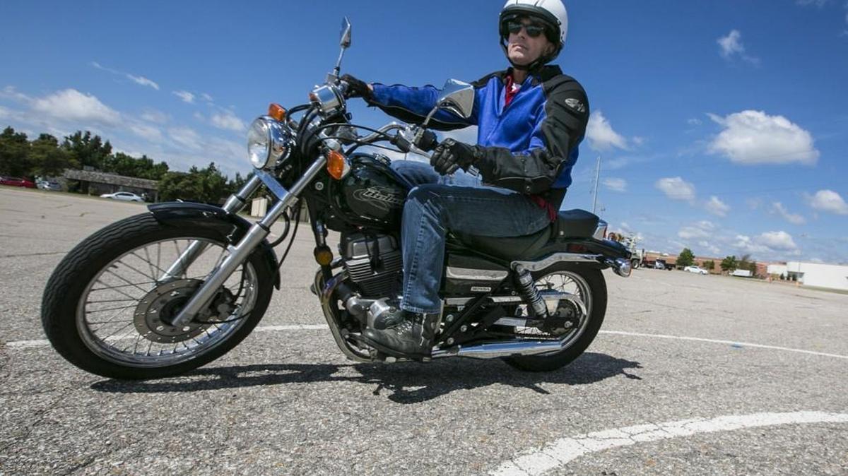 
Mike Vermillion teaches motorcycle safety with his Motorcycle Rider Education classes he holds by Towne West Square. (Sept. 11, 2015)
