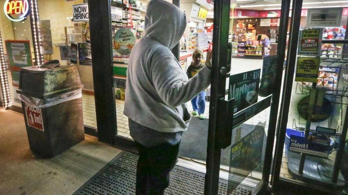 Heidi waits for son to come out of convenience store after using its bathroom Monday. (Dec. 12, 2016)