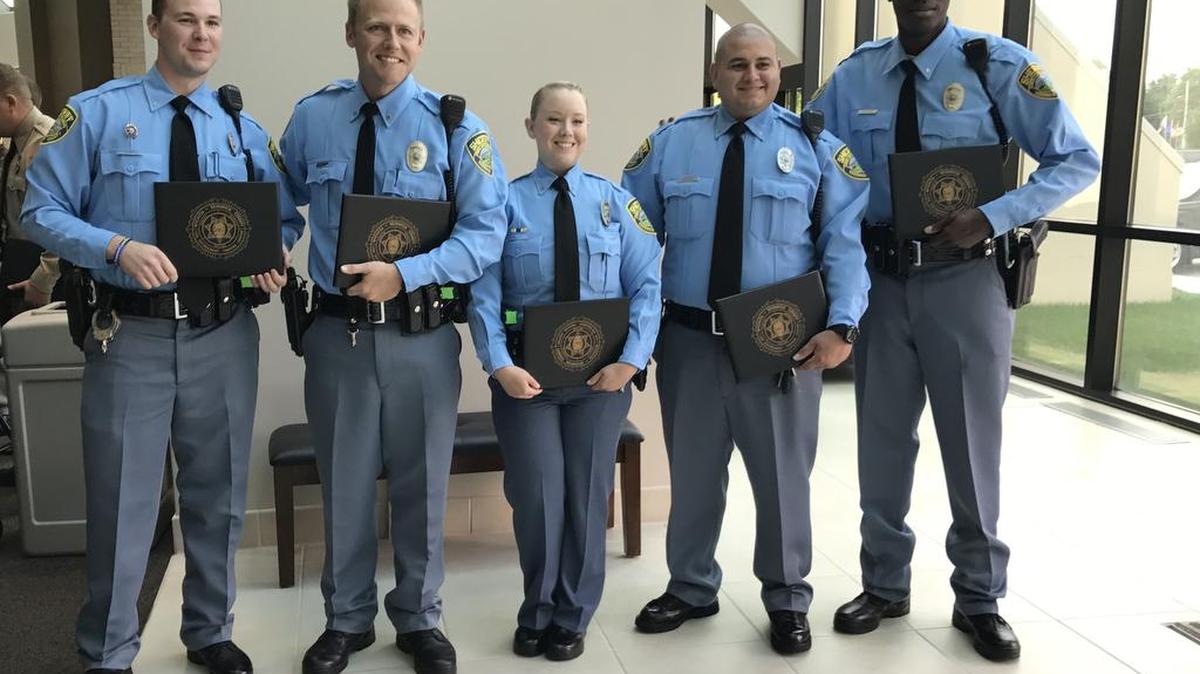 The Sedgwick County Sheriffs Office had five new deputies graduate Friday (from left): Seth Litton, Clayton Blackwood, Melissa Howell, Raymond Paredes and Vince Folston.