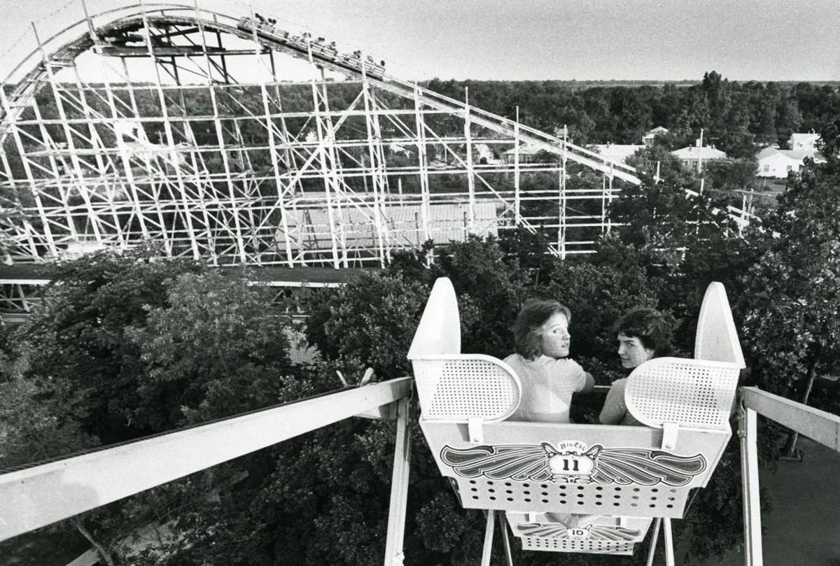 Kids ride the Ferris wheel at Joyland in 1983.