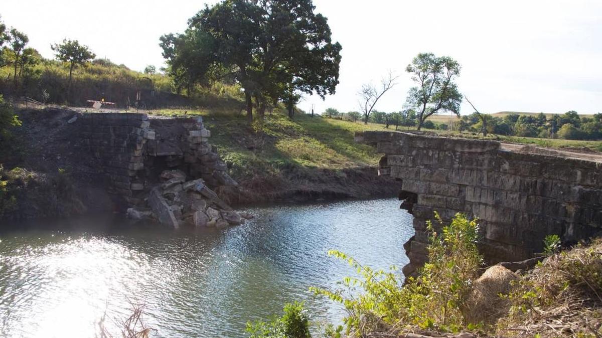 One of the stone bridges in Cowley County was destroyed Saturday night by floodwaters. The area received 6 inches of rain on Friday.
