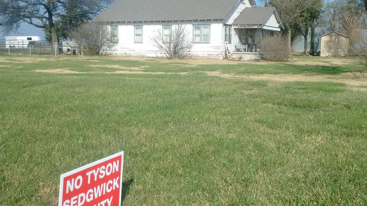 The Jaax family, who own this house at the corner of 71st Street South and Tyler, say they turned down an offer to possibly sell some of their land for a Tyson chicken plant.