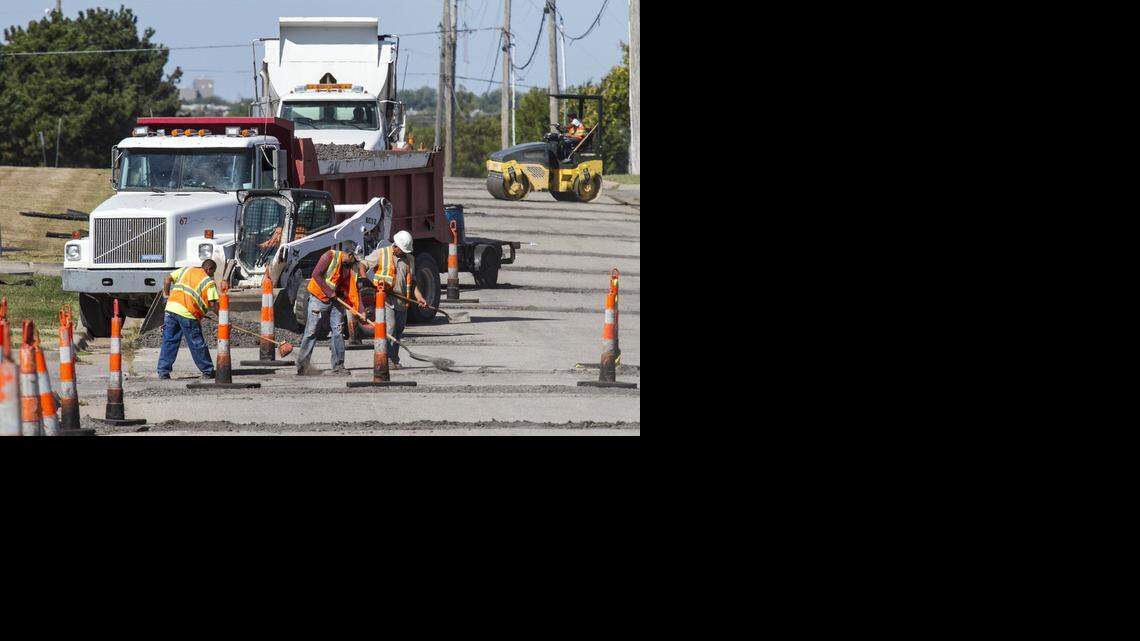 
A Barkley Construction crew repairs thermal cracks on 35th Street North near Webb Road last week as part of the city’s ongoing contract maintenance work. Thermal cracks are an inch or two wide and run from curb to curb. They develop from the cycling of hot and cold temperatures over several years. (Sept. 22, 2014)
