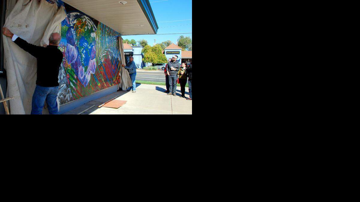 
A mural by artist Thomas Murillo was unveiled Saturday at Watermark Books, Douglas and Oliver. It is the fourth in a series of murals commissioned for the Douglas Design District.
