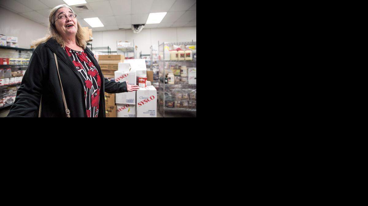 
Social Services director Sherri Flippo talks about the temporary location for Meals on Wheels after a fire damaged the kitchen in 2014. The kitchen has now reopened at the program’s main building at 200 S. Walnut. (Dec. 8, 2014)
