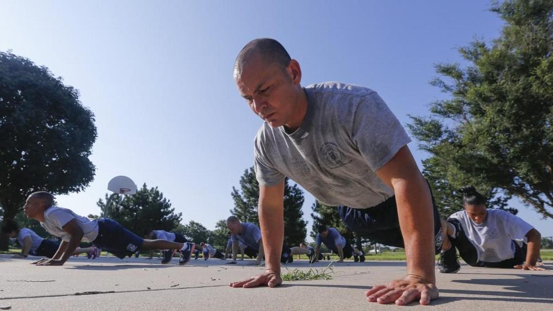 Victor Perales does push-ups at the Law Enforcement Training Center.