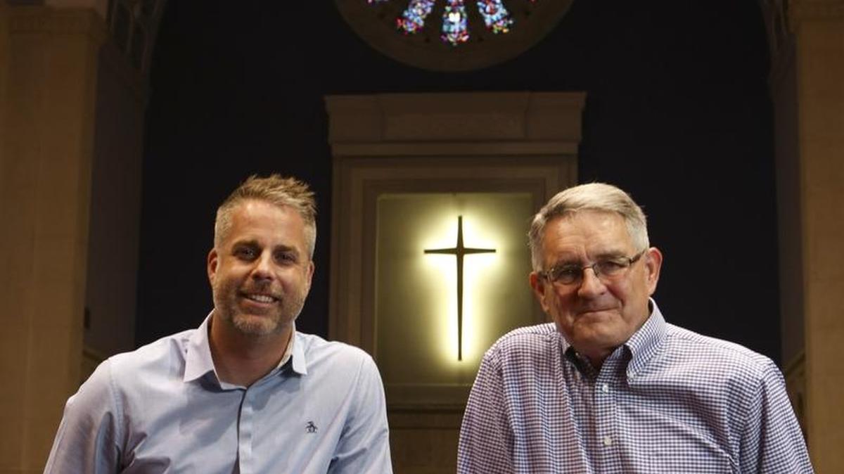Casey Casamento, left, pastor at City Life Church, and Steve Toews, pastor at First Baptist Church, are preparing for the merging of their congregations beginning on Sunday. Casamento will become the lead pastor of the new church, to be called City Life Church, and Toews will be on the pastoral team. The church’s home will be the First Baptist location at 206 E. Second St. (June 6, 2016)