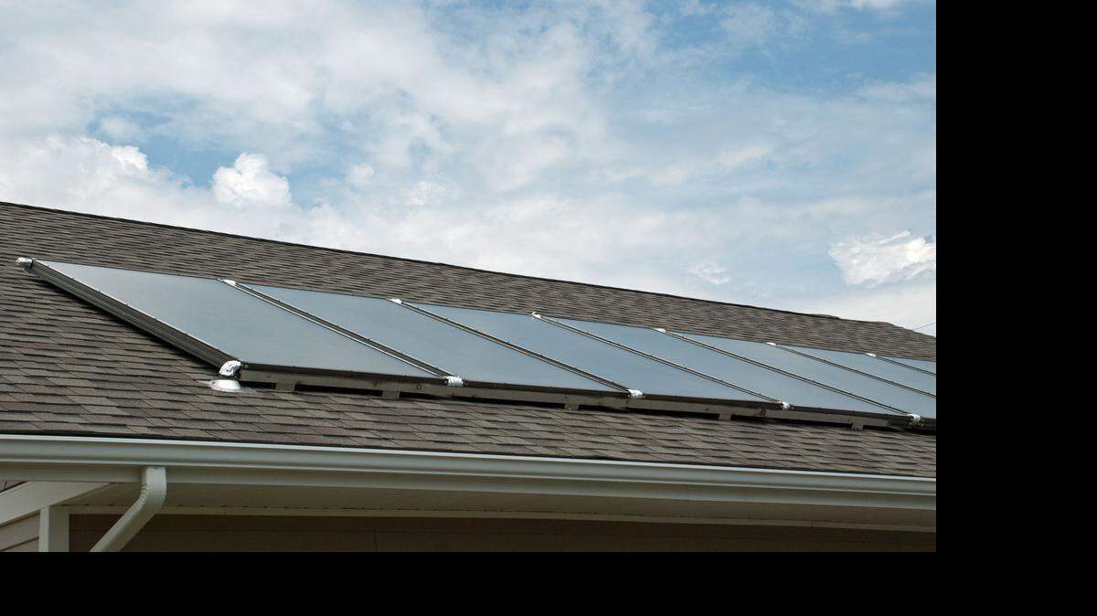 
Solar panels heat the water and floors of a house on South Lorraine. The Alliance for Solar Choice and solar-system installers are upset over a proposal by Westar to bump up base rates for future customers who generate some of their own electricity by putting solar panels on their roofs.
