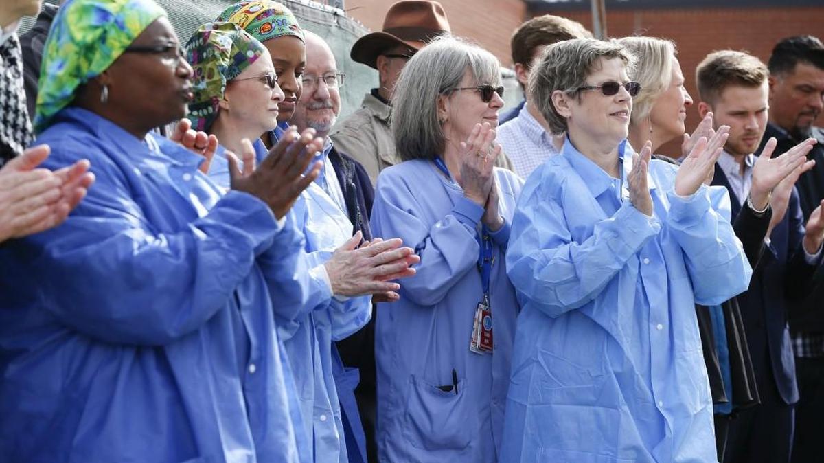 Hospital staff of the Robert J. Dole VA Medical Center applaud speakers Wednesday during a groundbreaking ceremony for an expansion that will provide more operating rooms, logistics, and a sterile processing service. (Nov. 1, 2017)