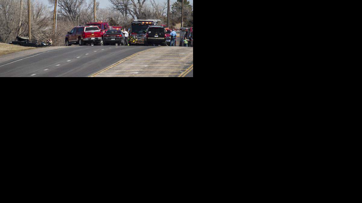 
Wichita and Sedgwick County officers investigate the scene of a fatal single-car crash near Pawnee and Woodlawn on Wednesday.

