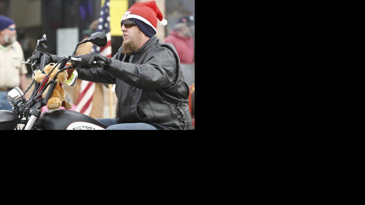 
Motorcyclists roll down Douglas in Delano during the 2013 Wichita Toy Run. Proceeds benefit U.S. Marine Corps Reserve Toys for Tots Program, the Salvation Army and the Kansas Food Bank. (Nov. 3, 2013)
