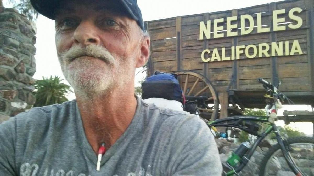 Keith Callison in Needles, Calif., at the start of his bicycle ride that would lead him to Wichita. During his ride he had only two flat tires; he kept extra tubes and was able to repair them.