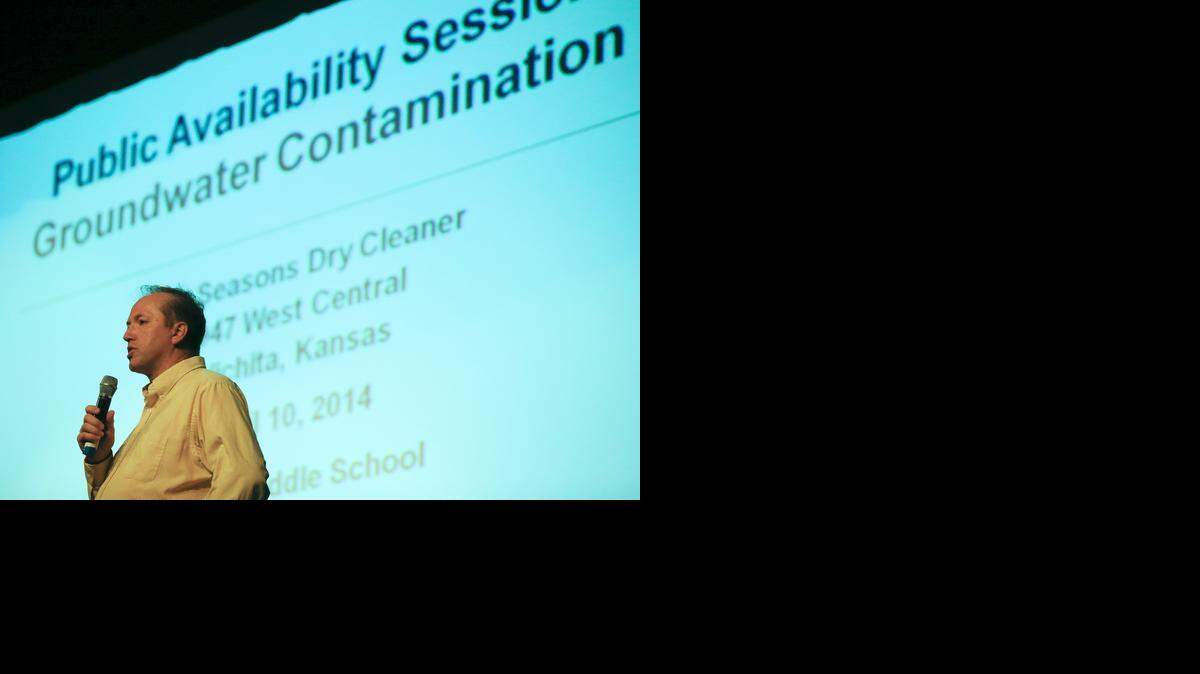 
Bob Jurgens of the Kansas Department of Health and Environment leads a public meeting about groundwater contamination at Wilbur Middle School last April. Connections to city water have been completed for 197 west Wichita residences, the Kansas Department of Health and Environment said Monday.
