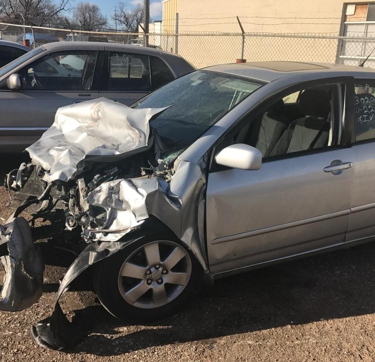 Amber Schutz’s car was destroyed after a head-on wreck the day before Thanksgiving. She said a truck driver was texting when he rear-ended a car that was stopped. That car was pushed into Schutz. Her dog, Mila, died in the wreck.