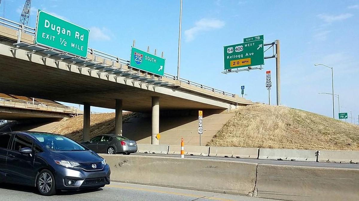 After crews restripe lanes on Kellogg, left lanes in both directions under I-235 will be closed, according to KDOT.