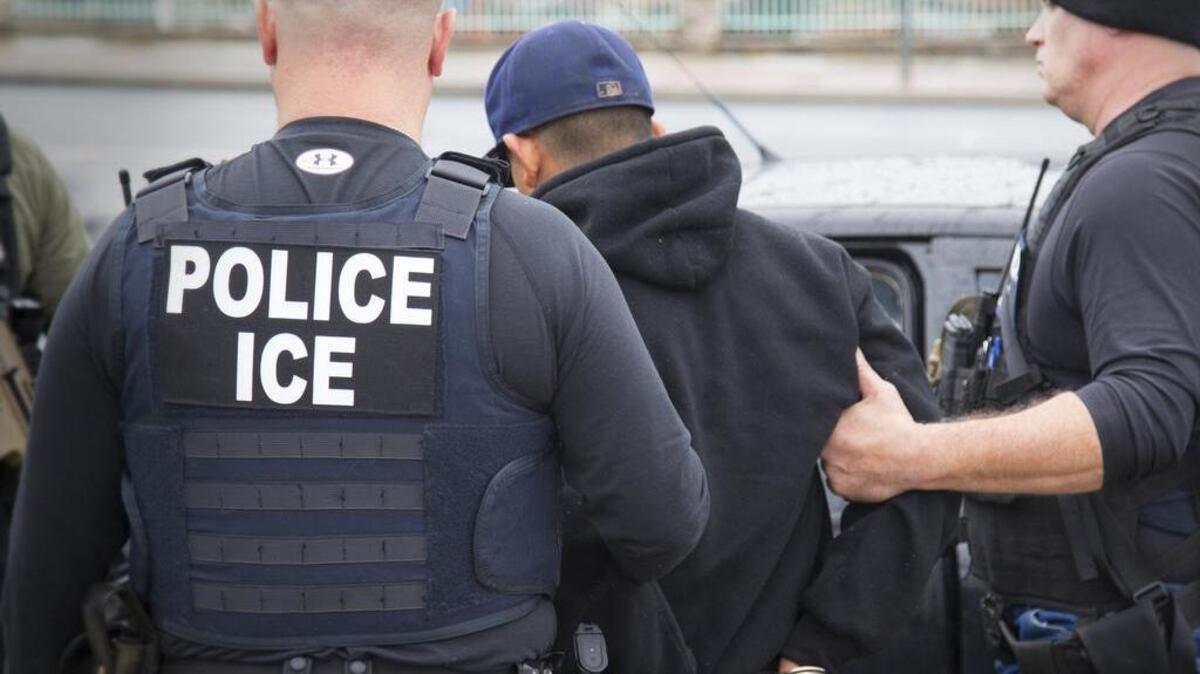 This Feb. 7 photo released by U.S. Immigration and Customs Enforcement shows foreign nationals being arrested this past week during a targeted enforcement operation conducted by ICE aimed at immigration fugitives, re-entrants and at-large criminal aliens in Los Angeles.