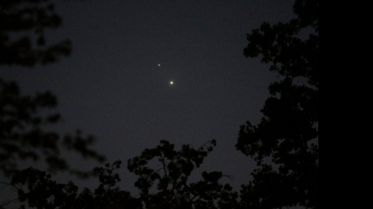 
The planets Venus, bottom, and Jupiter when they were unusually close together in late June.
