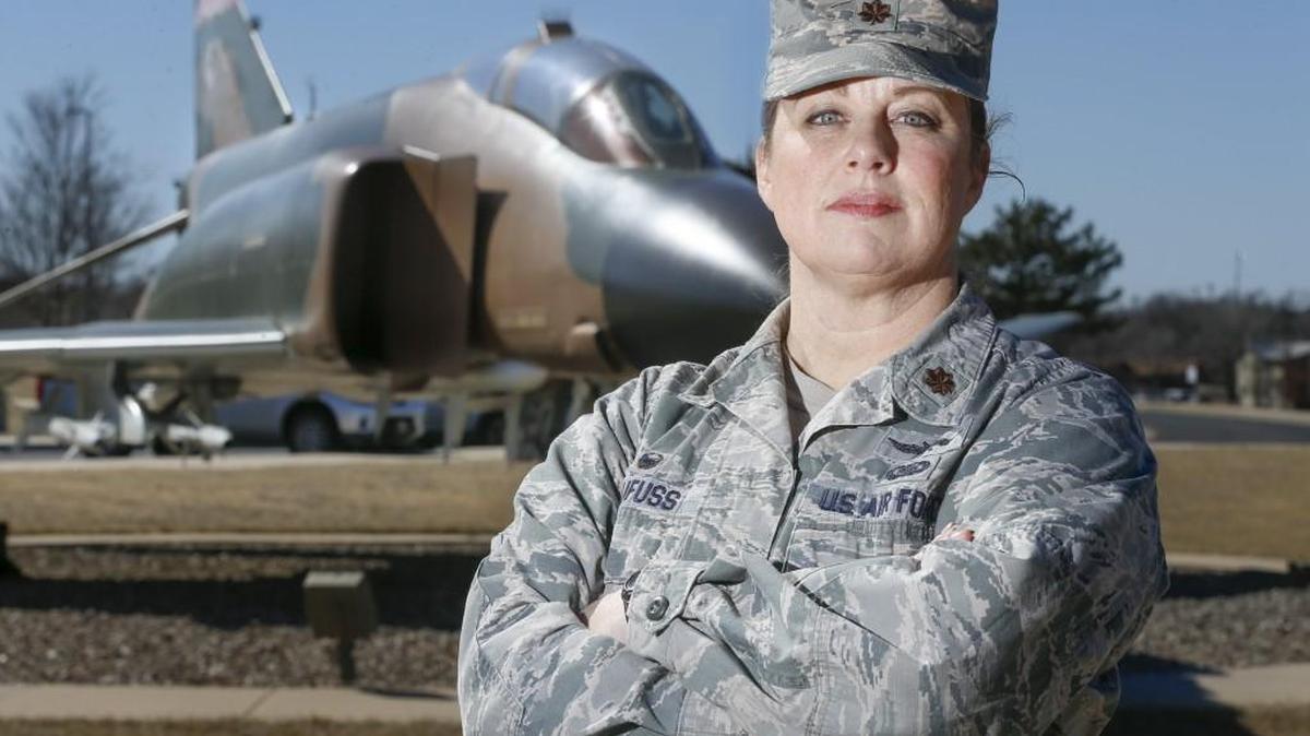 Maj. Janell Blaufuss poses for a picture near her office for the 184th Intelligence Wing of the Kansas National Guard on Wednesday. She led 425 combat missions while sitting at a computer at McConnell Air Force Base, where she provided real-time video intel using drones for troops on the ground in Iraq and Afghanistan. (Feb. 15, 2017)