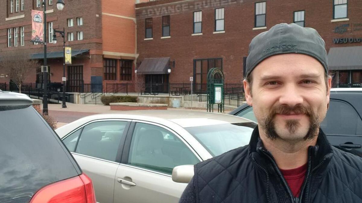 Jeff Yocky says he likes living in the Rumley apartments in Old Town and supports a police plan to have surveillance camera coverage over the district for security.