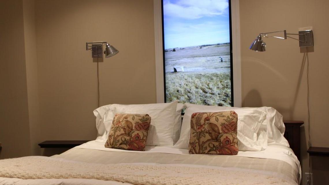 A bedroom in the Survival Condo complex, a converted missile silo, includes a live video feed of the world outside.