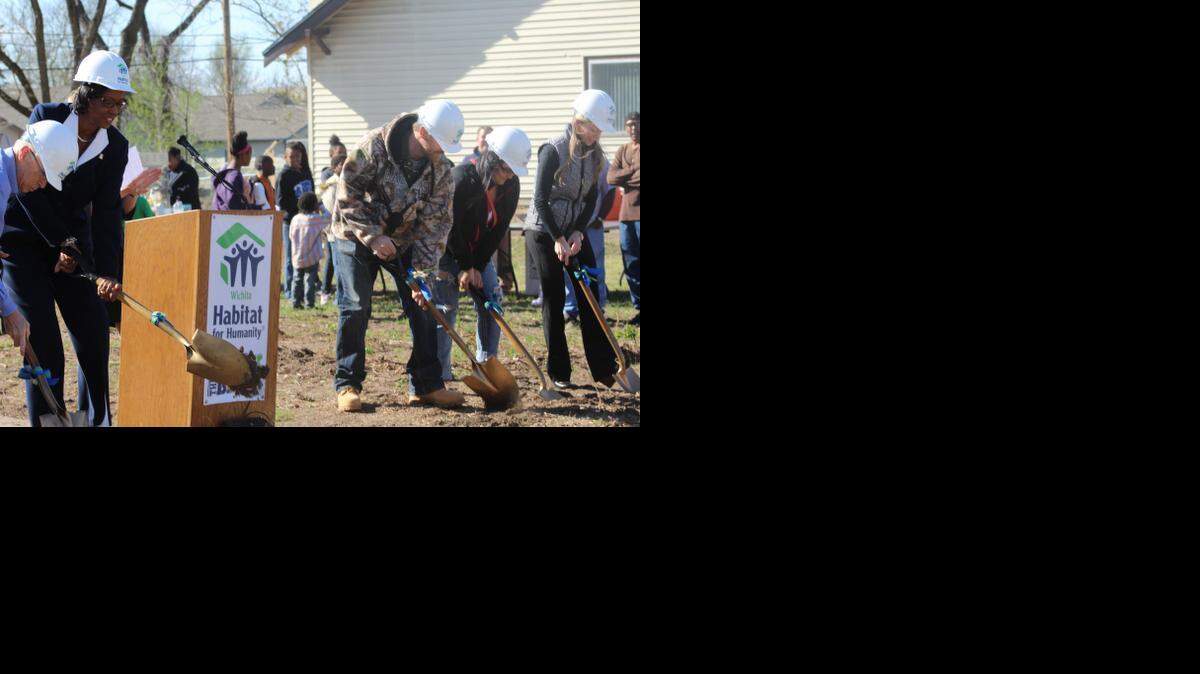 
From left, Wess Galyon with the Wichita Area Builders Association, City Council member Lavonta Williams, Schuyler Berry, Leticia Berry and Nicole Alexander with Textron Aviation break ground with Habitat for Humanity on Thursday.
