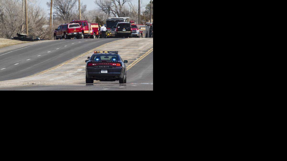 
Wichita and Sedgwick County officers investigate the scene of a fatal single-car crash near Pawnee and Woodlawn. A black Monte Carlo left the roadway around 1 p.m. and struck a utility pole. Two people died at the scene and two more suffered potentially serious injuries.
