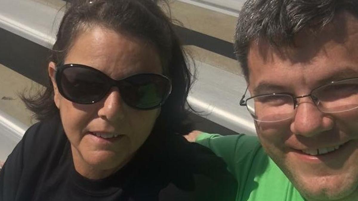 Karen Capps was killed in west Wichita in February when she pulled over to wait for a funeral procession to pass. Her son, Michael Capps, is suing Pizza Hut and one of its drivers over the collision.
