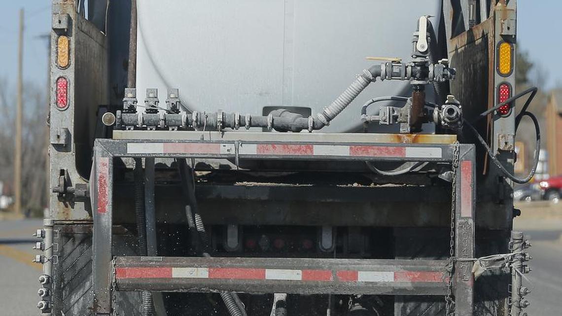 A city truck spreads a salt solution on Wichita streets in preparation for winter weather in 2013. With an ice storm forecast for this weekend, public works crews have been laying down salt brine on city streets since Monday.