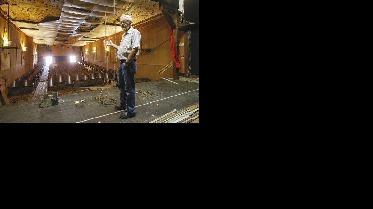 
Darrell Albright stands of the stage of the dilapidated Civic Theater in Pretty Prairie. The theatre opened in 1936 and had closed by the 1970s. Albright moved there in 1982 and reopened the theater with his wife, Joyce. They showed old movies and had play productions in the building until last summer when a storm ripped through Pretty Prairie and high winds tore the roof off the building. The theater hasn’t reopened since the storm, but there is a plan in the works to have the high school students take it on as an entrepreneurial project.
