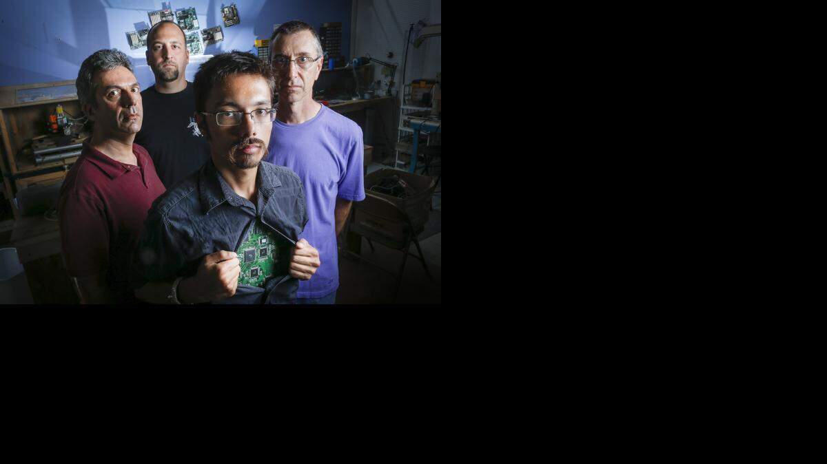 
From left, John Harrison, Jens Torell, Dominic Canare and Tom McGuire are founders of MakeICT, a nonprofit group of engineering-educator-artist-musician innovators. They teach workshops about using 3-D printers and soldering irons.
